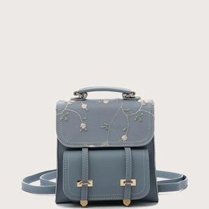 Flower embroidered backpack